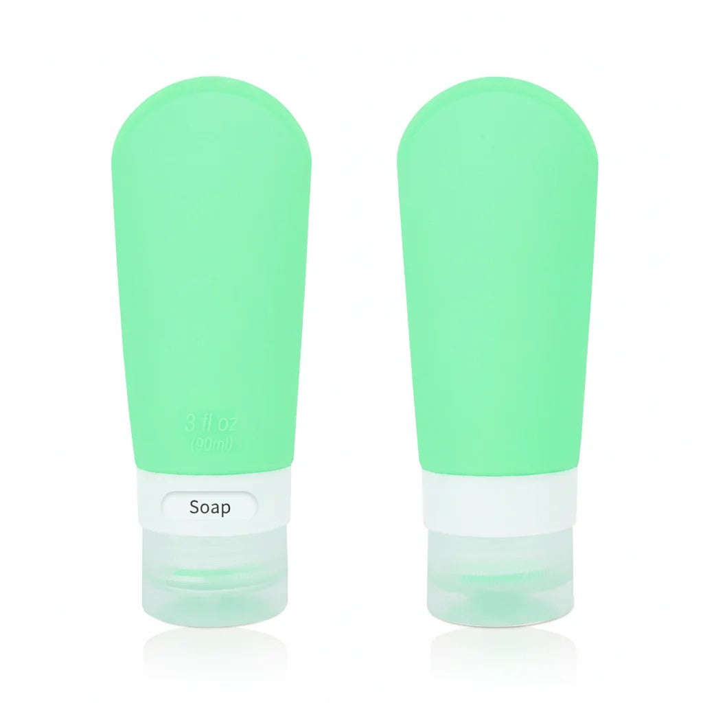 2-Pack Mint Green Flexible Silicone Leakproof Travel Squeeze Bottles with Clear Label Base and Flip-Top Caps on white background