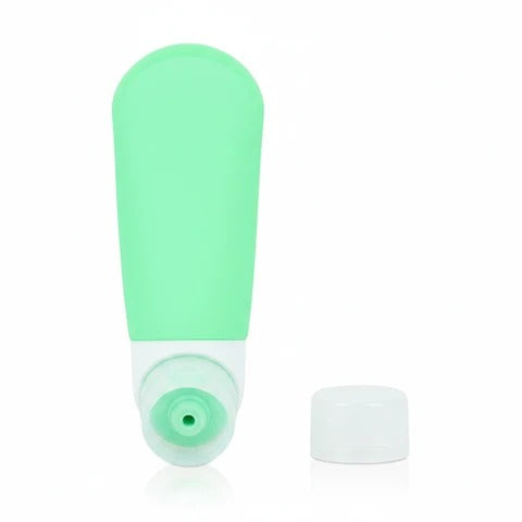 imgi_6_Mint_green_silicone_travel_bottle_with_bottom_cap_removed_showing_wide_mouth_opening_for_easy_refilling_on_white_backgroun