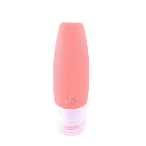 imgi_8_Coral_pink_silicone_travel_squeeze_bottle_60ml_standing_upright_on_pure_white_background_main_product_image