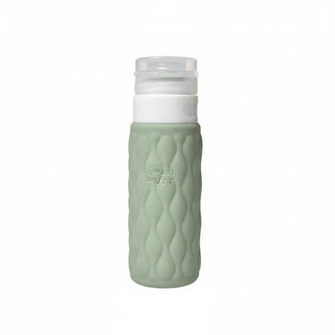 imgi_9_Sage_green_diamond_textured_silicone_travel_cosmetic_bottle_with_white_pump_cap_upright_on_pure_white_background_mai